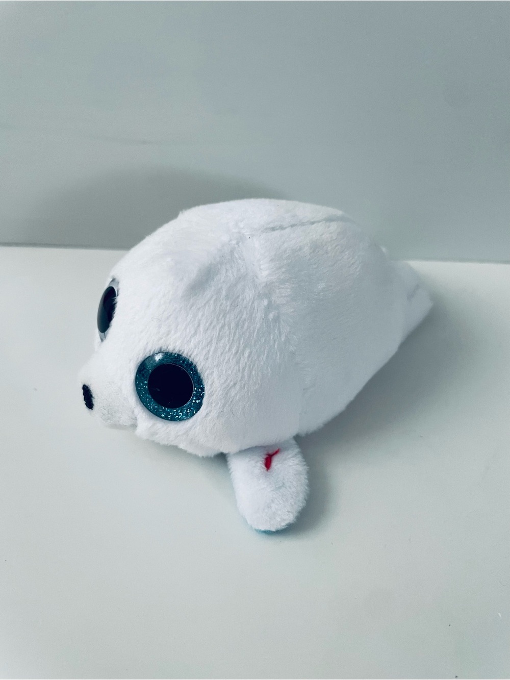 White Plush Seal Toy with Sparkling Teal Eyes